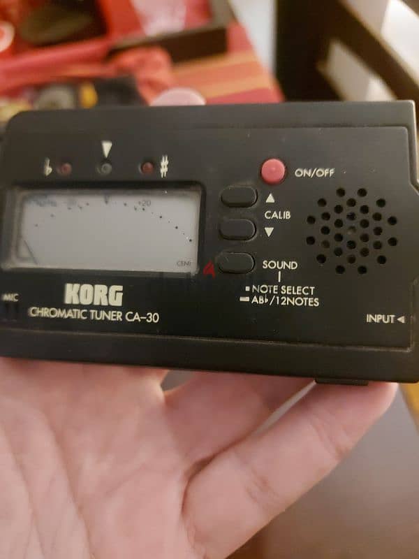 korg tuner . . . ca 30. . for any stringed instrument 0