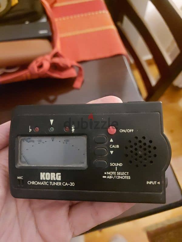 korg tuner . . . ca 30. . for any stringed instrument 2