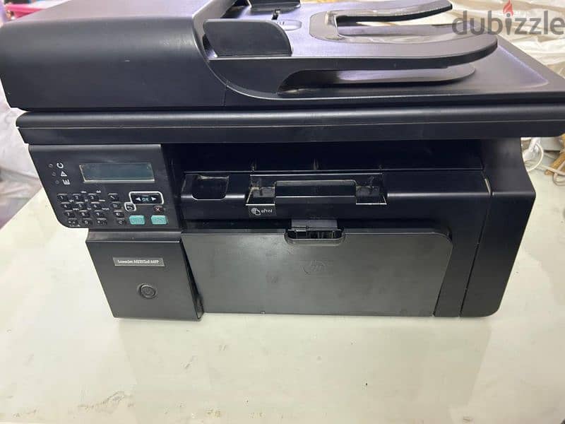 طابعة HP موديل laserjet M1212nf MFP 1