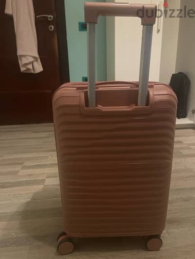 pink cabin size suitcase