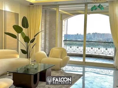 With a return in dollars finished hotel apartment with ACs directly on Maadi Nile Corniche in interest free installments and hotel service from Hilt