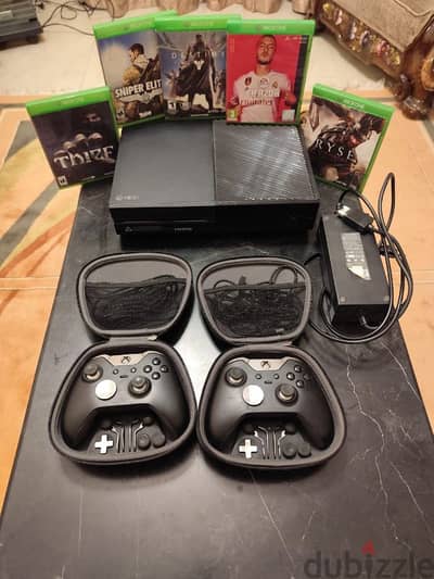 Xbox with 2 joysticks and 5 video games