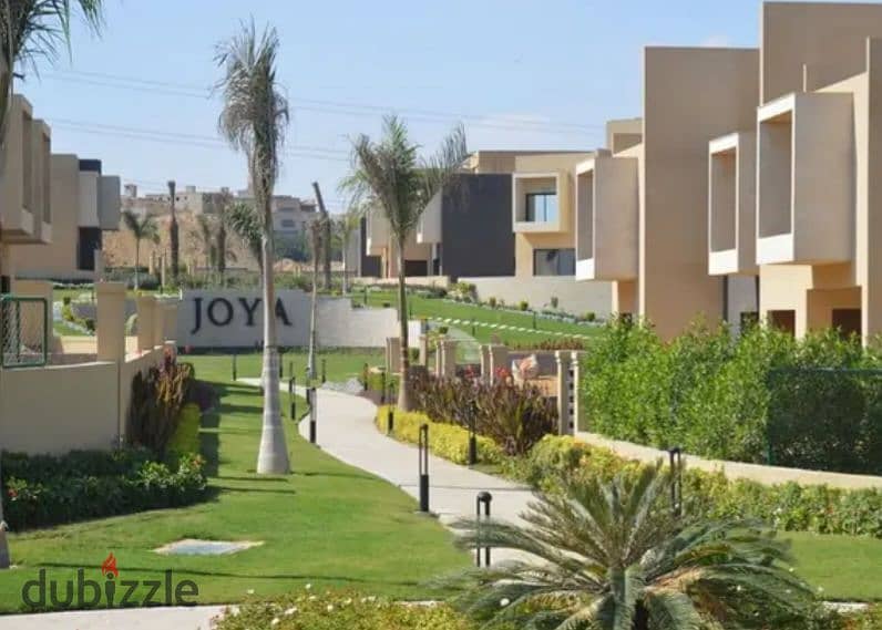 A ready-to-move-in apartment immediately available in front of Nile University, Joya Compound by Hassan Allam Company. 0