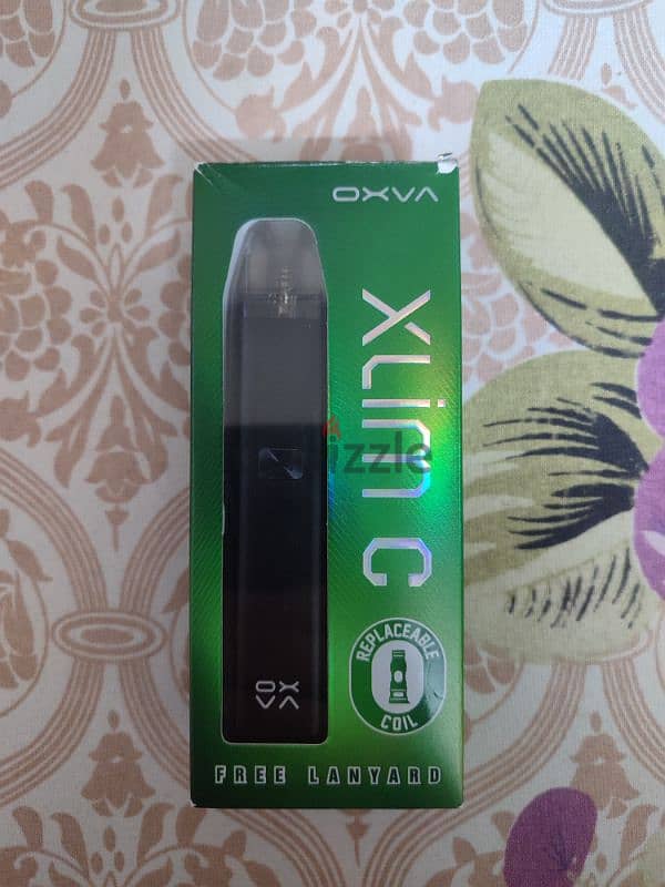 vape pod oxava xlim C جديده بالعلبه ومعاها كويل و اتنين ليكويد وعليقه 0