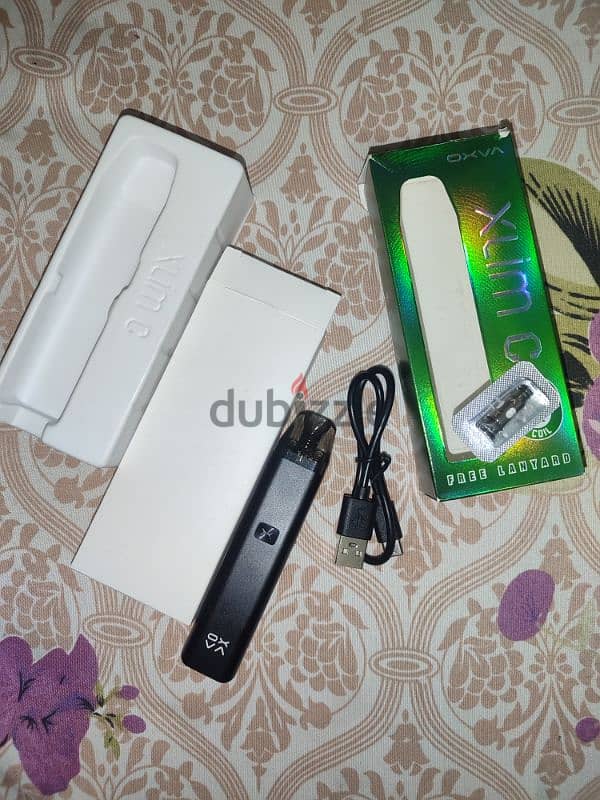 vape pod oxava xlim C جديده بالعلبه ومعاها كويل و اتنين ليكويد وعليقه 8