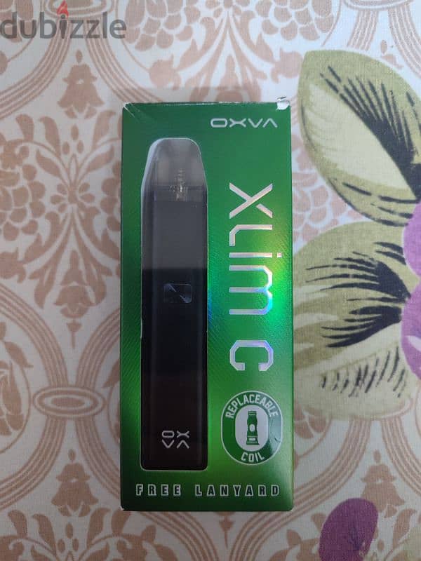 vape pod oxava xlim C جديده بالعلبه ومعاها كويل و اتنين ليكويد وعليقه 0