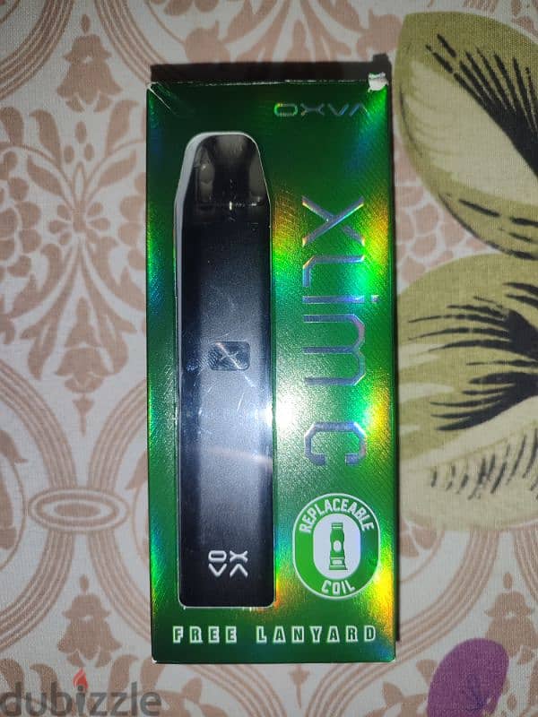 vape pod oxava xlim C جديده بالعلبه ومعاها كويل و اتنين ليكويد وعليقه 1