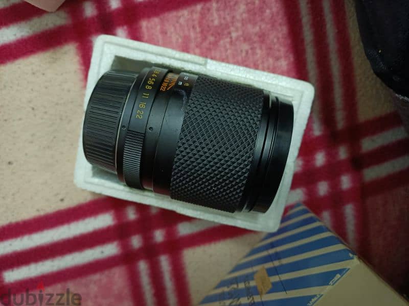 عدسه yashica 135mm f2.8 filter size 55mm 1