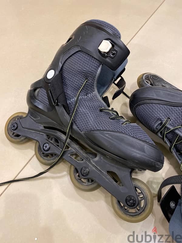 OXELO fit 100 Adult inline skates Size 45 Black 1