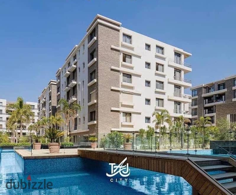 For sale, a 160 sqm apartment with a 50% cash discount on the total price and the rest over 8 years in Taj City Compound in the First Settlement 0