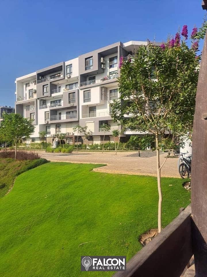 140 m ground floor apartment with a garden for sale in Taj City Compound with a 50% discount on cash 0