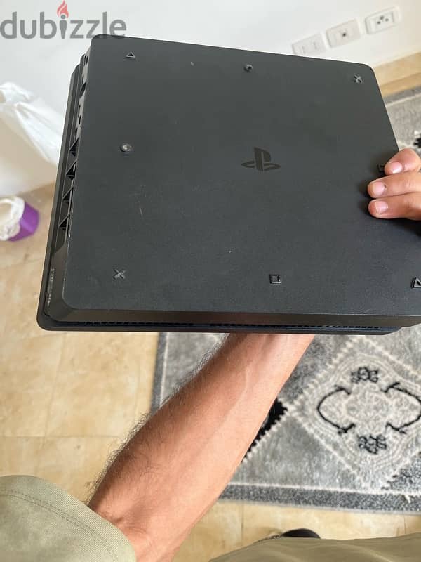 playstation 4 slim 1tb like new with original controller 2