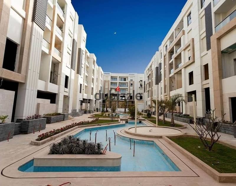 For sale, fully finished apartment with air conditioners and kitchen, two rooms, 127 sqm, installments up to 6 years, in VALORE Compound 0