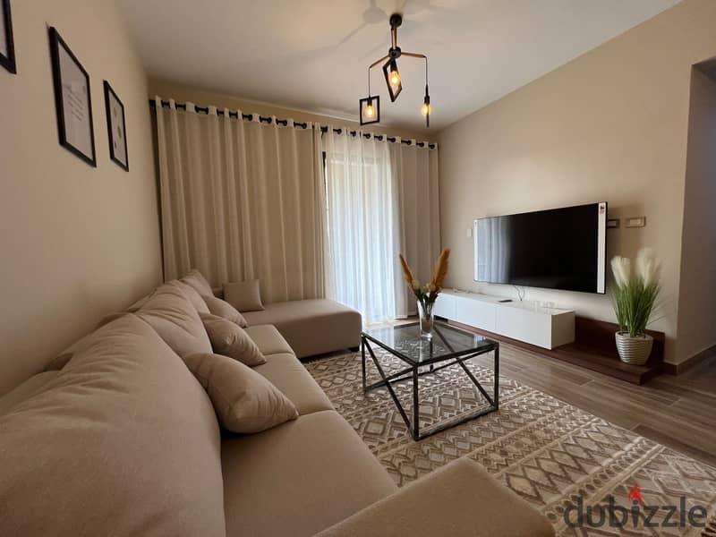 Elegant 2 bedrooms apartment for rent in eastown sodic compound beside mivida & hyde park (fully furnished - first use) 0