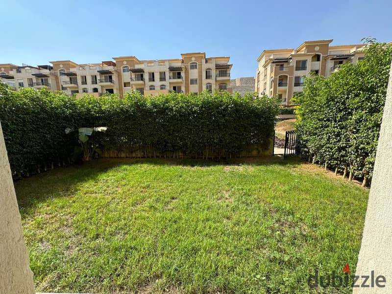 Ground Super lux apartment for sale with kitchen in Stone Residence New Cairo 0