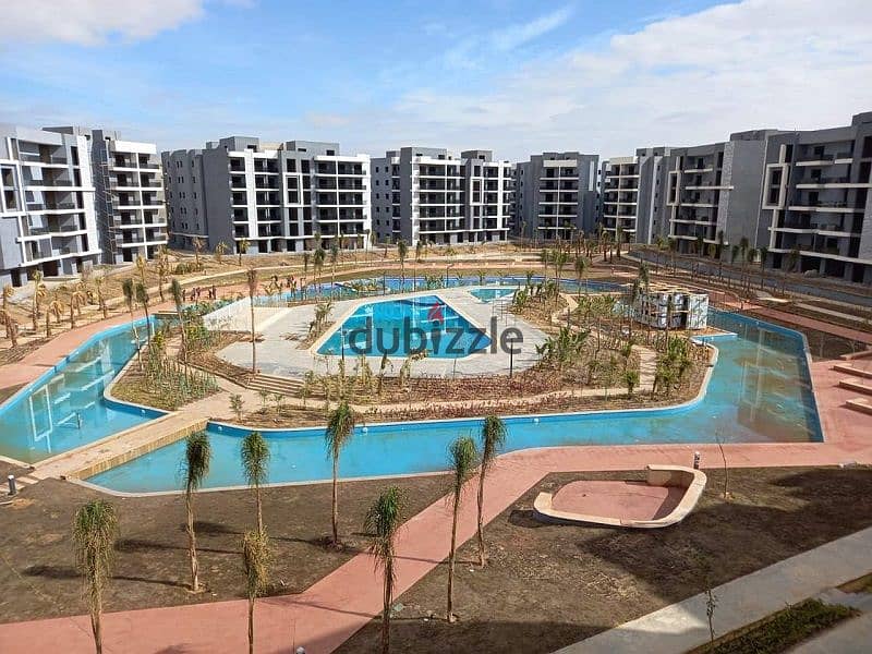 Resale apartment 145 m in Sun Capital Compound, fully finished, with a view of 5 acres of landscape and lakes, at the lowest price in October, October 0