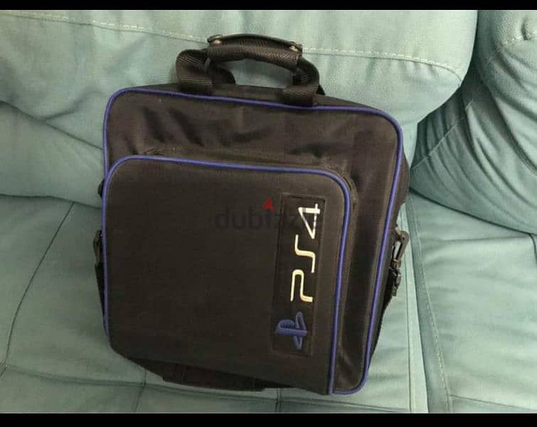 Playstation 4 Slim 1 TB with 2 dual scenes+bag بلاستيشن ٤ معاه دراعين 3