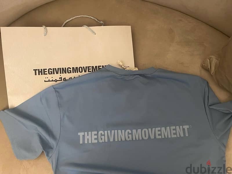 THE GIVING MOVEMENT OVERSIZE TSHIRT 1