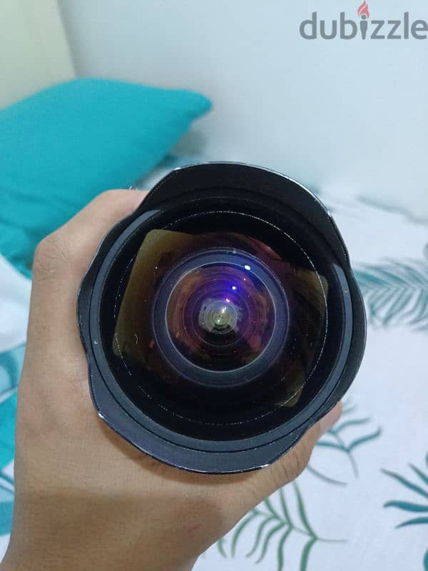 عدسه سجما كانون 14 mm  فاتحه 2.8الترا وايت استعمال خفيف جدا مفهوش حاجه 1