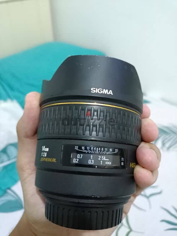 عدسه سجما كانون 14 mm  فاتحه 2.8الترا وايت استعمال خفيف جدا مفهوش حاجه 4