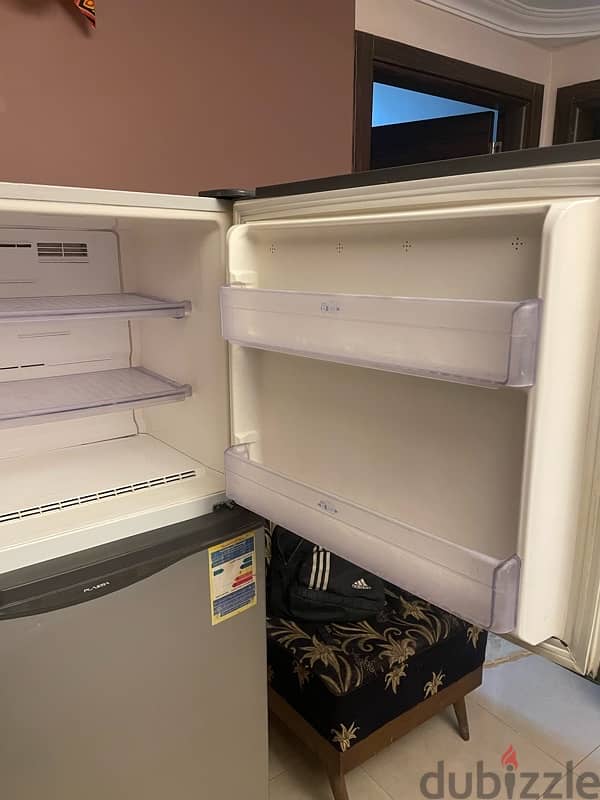 toshiba refrigerator like new (inverter - plasma) 0