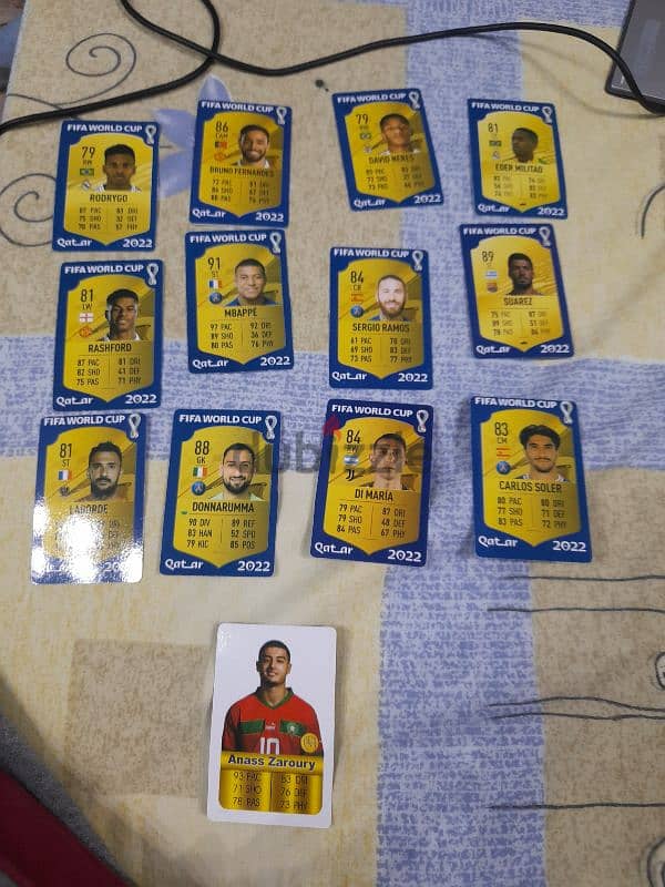 selling 12 random football player cards + 1 + Hakimi 1