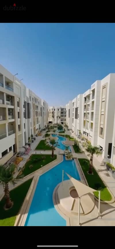 Near Al-Ahly Club, a fully finished apartment with air conditioners, 3 rooms, for sale inside a residential compound