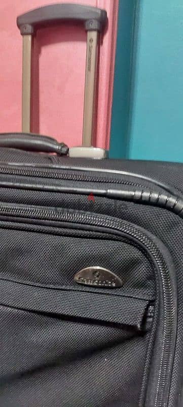 حقيبة سفر ماركة SAMSONITE اصلية سوداء اللون اكبر حجم بعدد 2 عجلة فقط 4