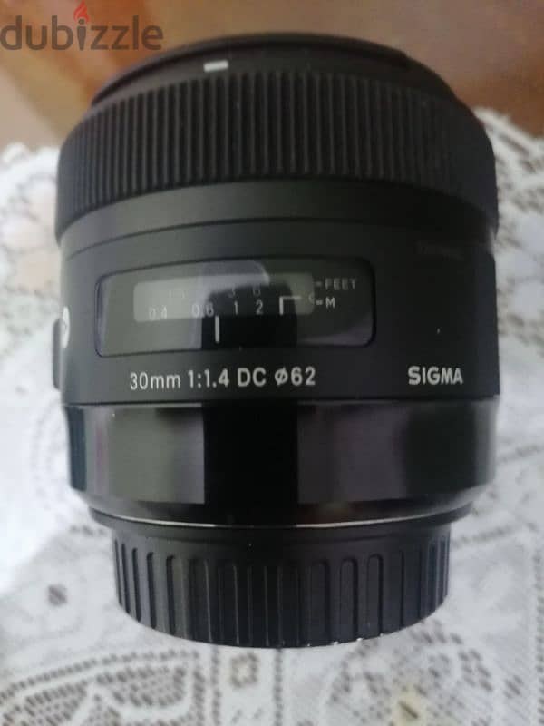 عدسة كانون sigma 30 from Dubai 1