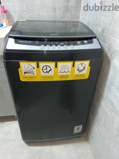 Zanussi 10kg Top load washing machine غسالة زانوسى ١٠ كيلو تحميل علوى