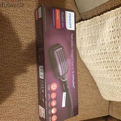 brand new Philips hair straightener brush