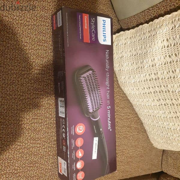 brand new Philips hair straightener brush 0