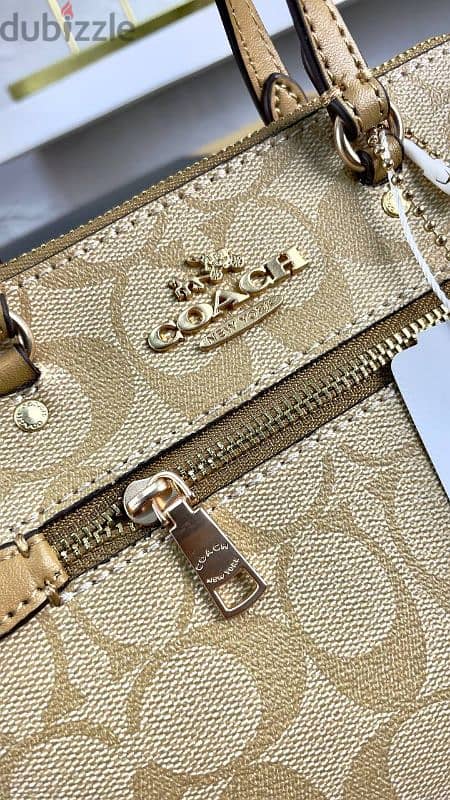 Coach  شنطه 3