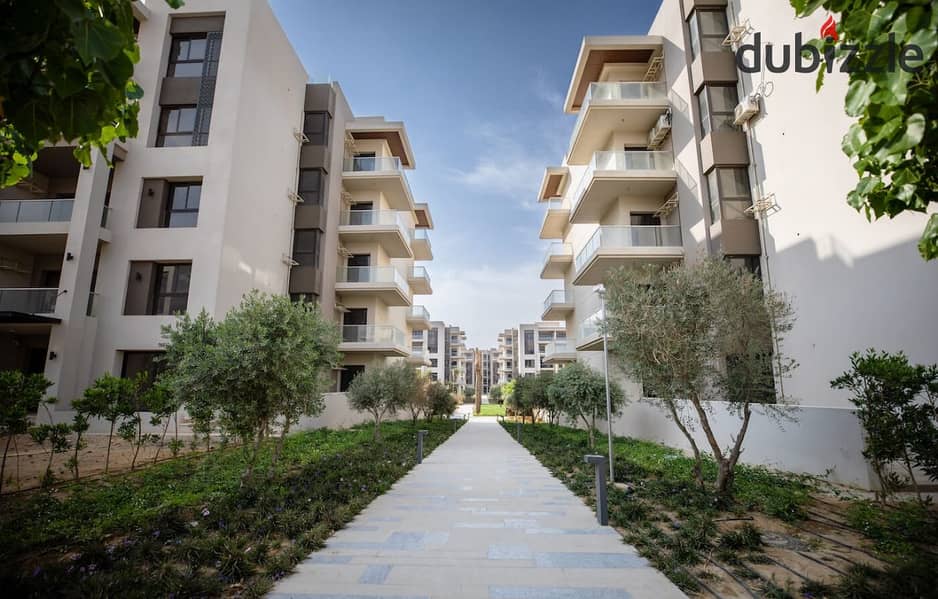 apartment with a garden, Ready to move, for sale in The Address East, New Cairo 0