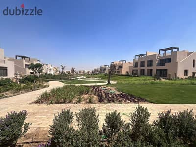 A finished villa with a lagoon view in Owest, Samih Sawiris, in front of Mall of Egypt, available for installment payments