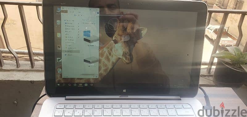 لاب وتابلت ويندوز تاتش وكيبورد hp  i5 رابع حاله محترمه يعمل بالشاحن 5