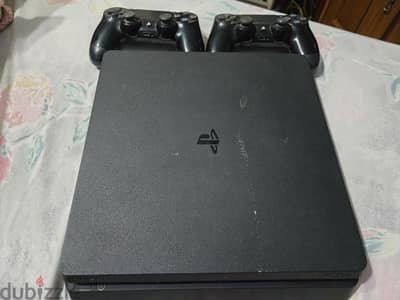 ps4 slim 500 with 2 controllers