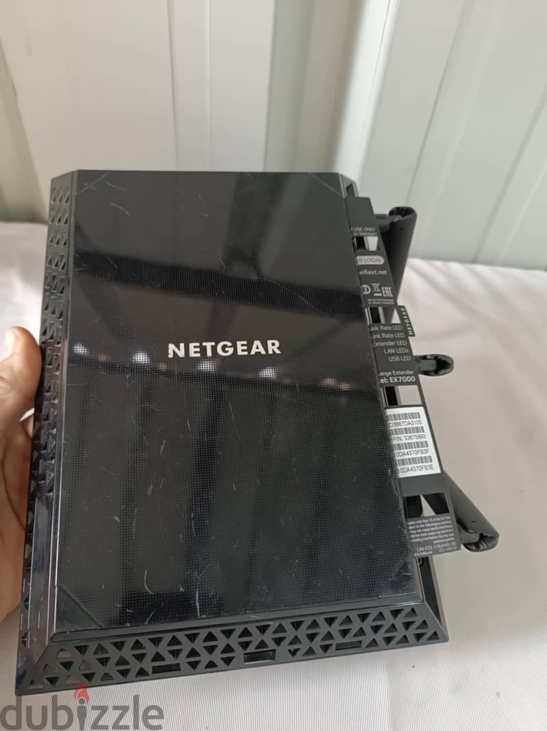 Netgear EX 7000 موسع شبكة الإنترنت 1