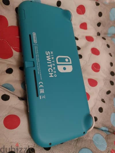 من غير العلبة nintendo switch lite مع لعبتين وكرت128g