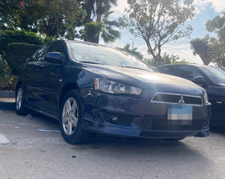 Mitsubishi Lancer shark 2009 - لانسر شارك ٢٠٠٩ 0