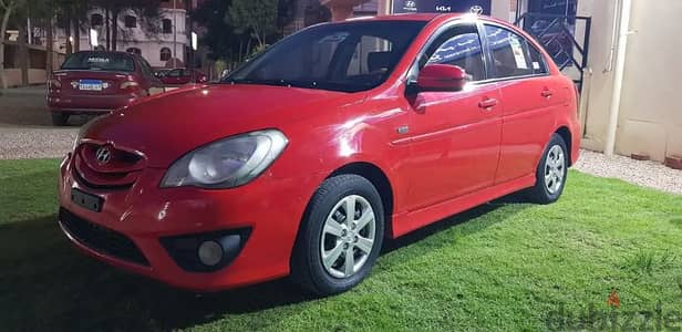 Hyundai new Accent 2011 sport  هيونداى نيو اكسنت سبورت احمر مالبورو