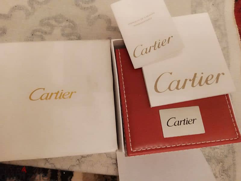 ساعة كارتيير جديده بالعلبة new cartier watch 4