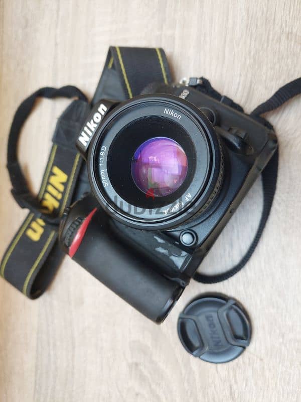 Nikon D7100 + 50mm 1.8D كاميرا نيكون ٧١٠٠ مع عدسة ٥٠مللي 3