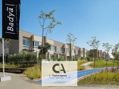 Apartment for sale, ground floor, garden, with only 5% down payment In the heart of October in Badya Palm Hills Compound View on the landscape | Insta