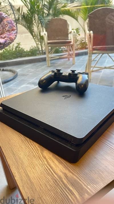 Playstation 4 Slim - 1TB , 2 Controllers (1 needs light  maintenance)