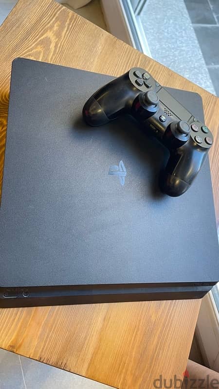 Playstation 4 Slim - 1TB , 2 Controllers (1 needs light  maintenance) 3