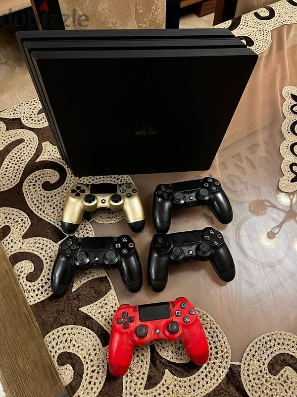 PlayStation 4 Pro With 4 Original controllers 1