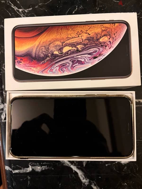 للبيع  IPHONE XS 256 جيجا ذهبي لون مميز بالكرتونة 1