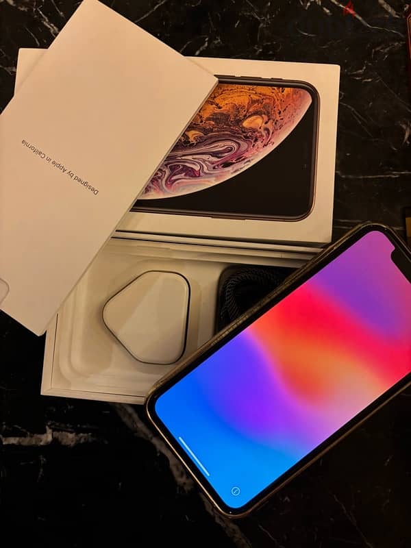 للبيع  IPHONE XS 256 جيجا ذهبي لون مميز بالكرتونة 5