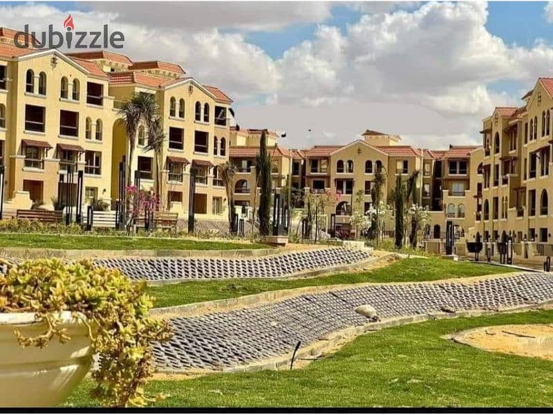 Apartment for sale ground floor with a garden, in installments in Maadi View Compound El Shorouk in front of Madinaty 0